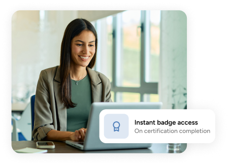 woman types on a laptop behind an 'instant badge access' tooltip
