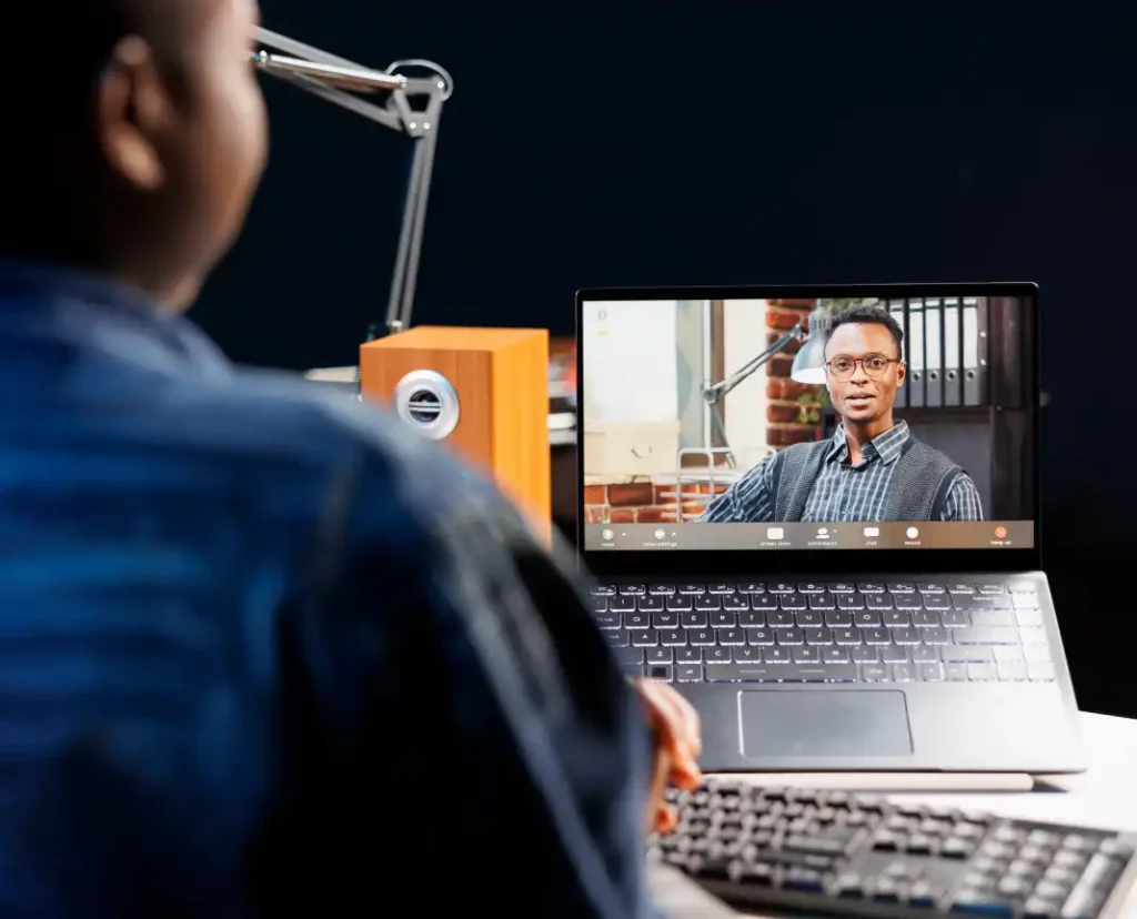 man records a podcast in a professional studio