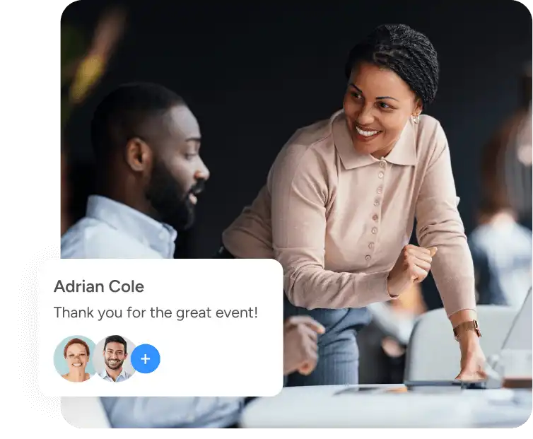professional colleagues talk, behind a message thanking for a great event