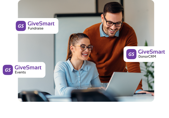 givesmart logos over a photo of coworkers looking at a laptop
