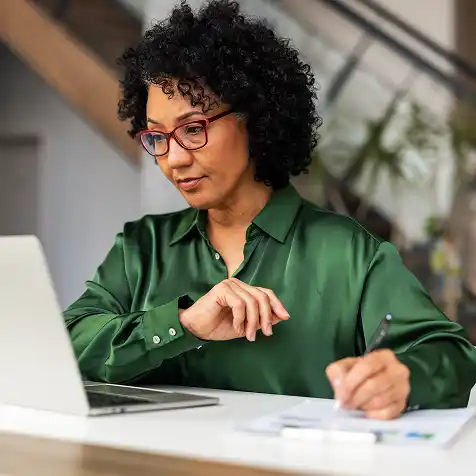 professional woman taking notes