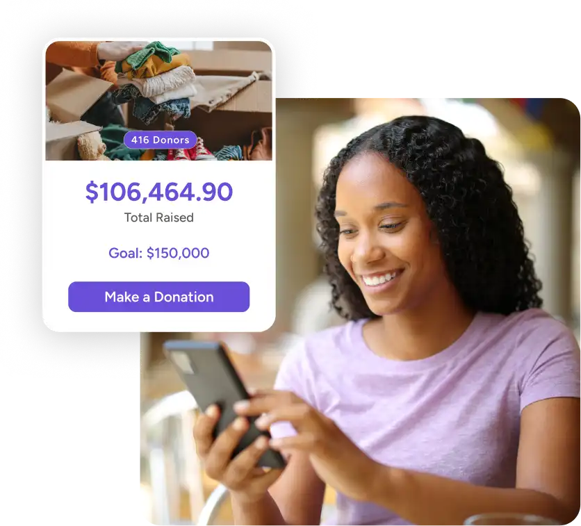 woman smiling at her phone with fundraising card