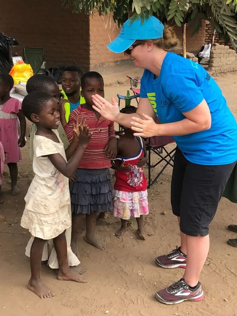 Tirrah Switzer working with children while assisting at an HIV/AIDS clinic in Ghana.